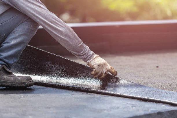 Professional Exterior Waterproofing technician working in Troy, NC